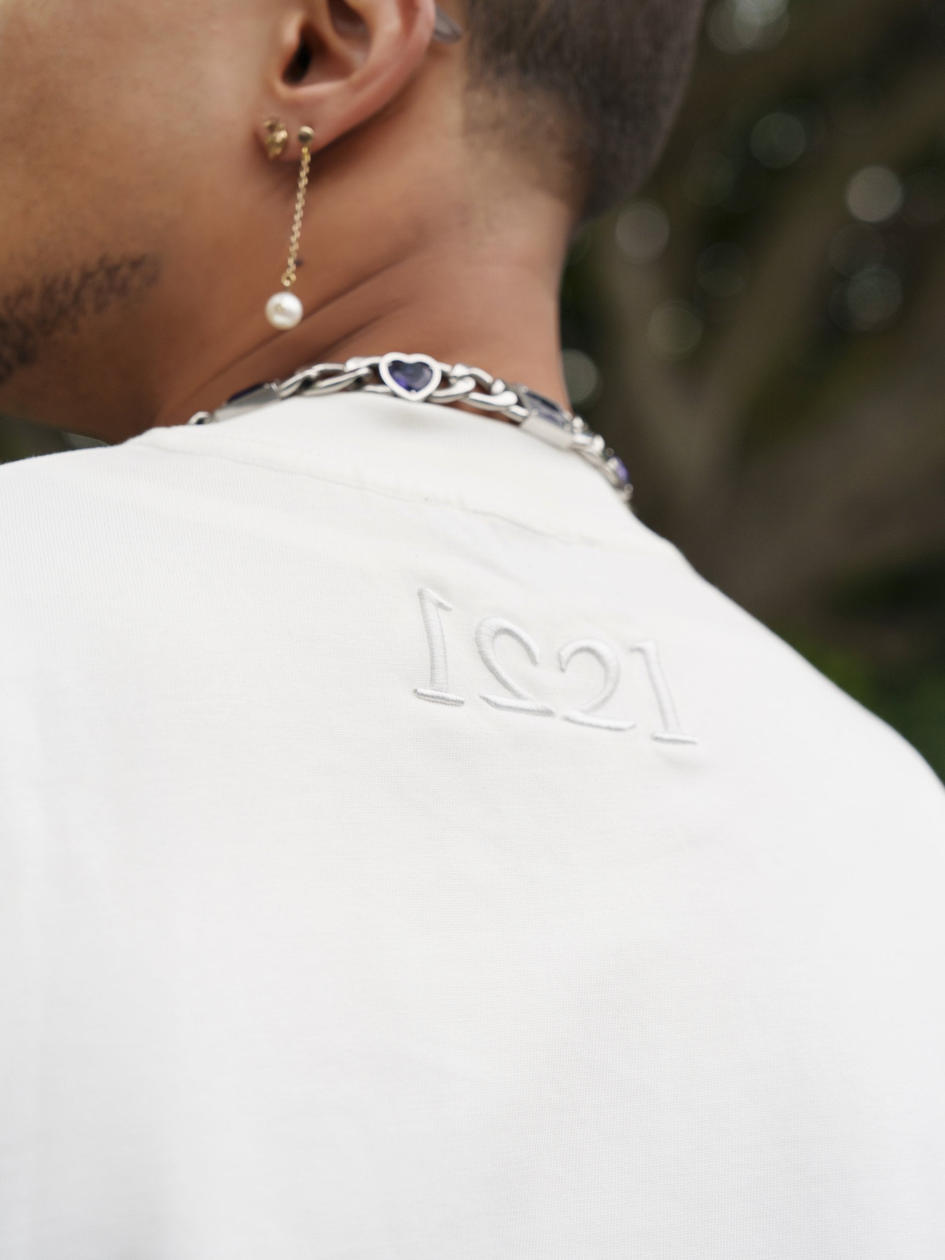 man wearing white tee