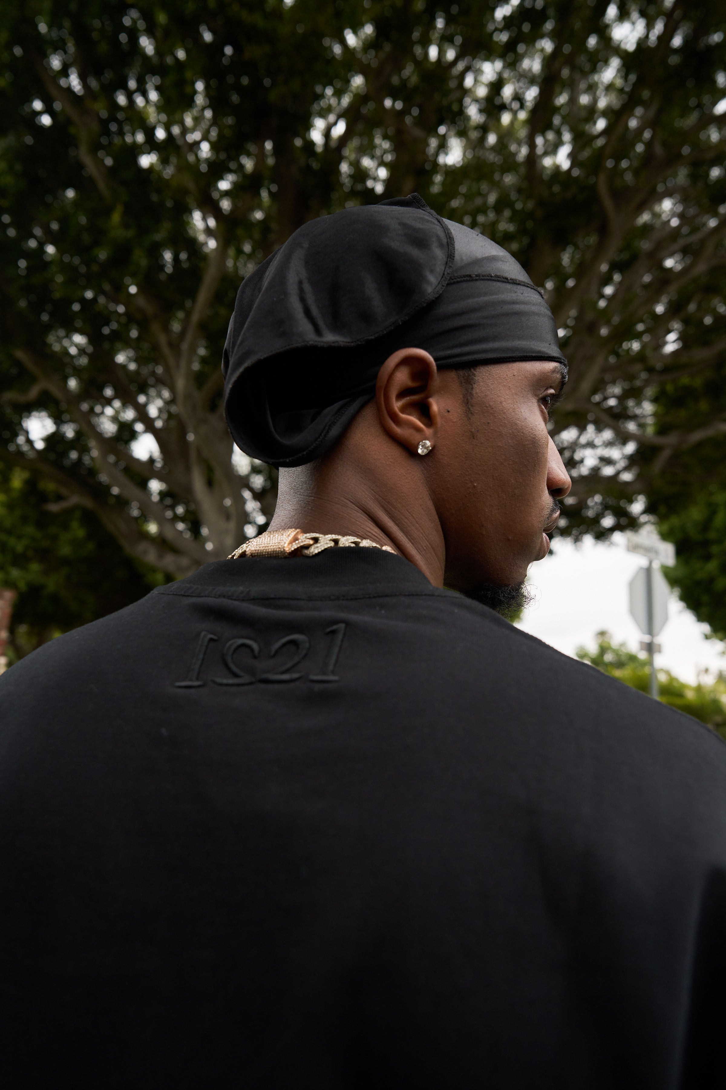 man wearing black tee