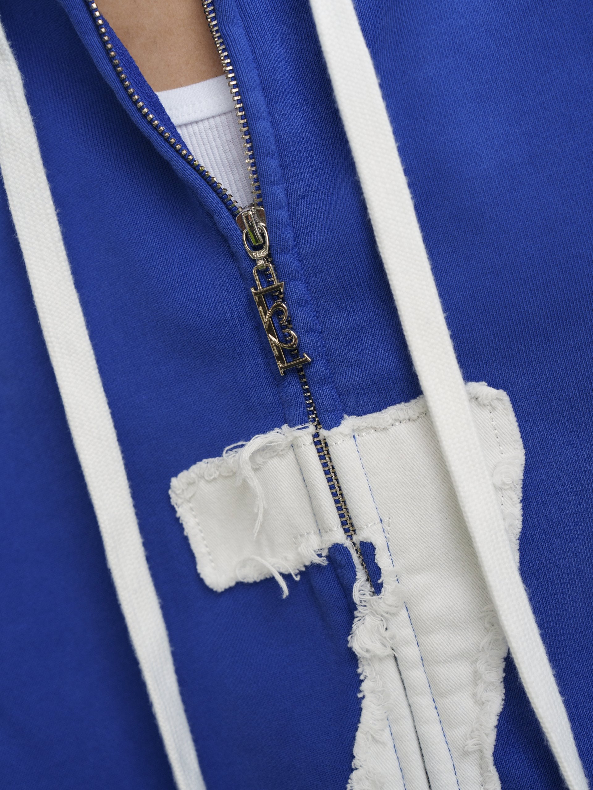 Male wearing blue hoodie